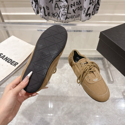 PRADA 26S COLLAPSE SNEAKERS IN BROWN CANVAS