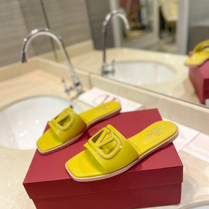 VALENTINO 26S SLIDES IN YELLOW CALFSKIN WITH LOGO