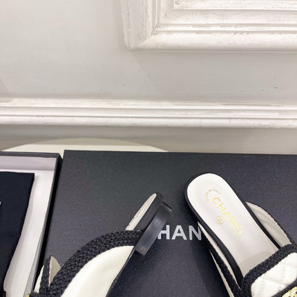 CHANEL 26S MULES IN WHITE LAMBSKIN AND BLACK FABRIC