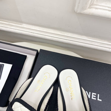 CHANEL 26S MULES IN WHITE LAMBSKIN AND BLACK FABRIC